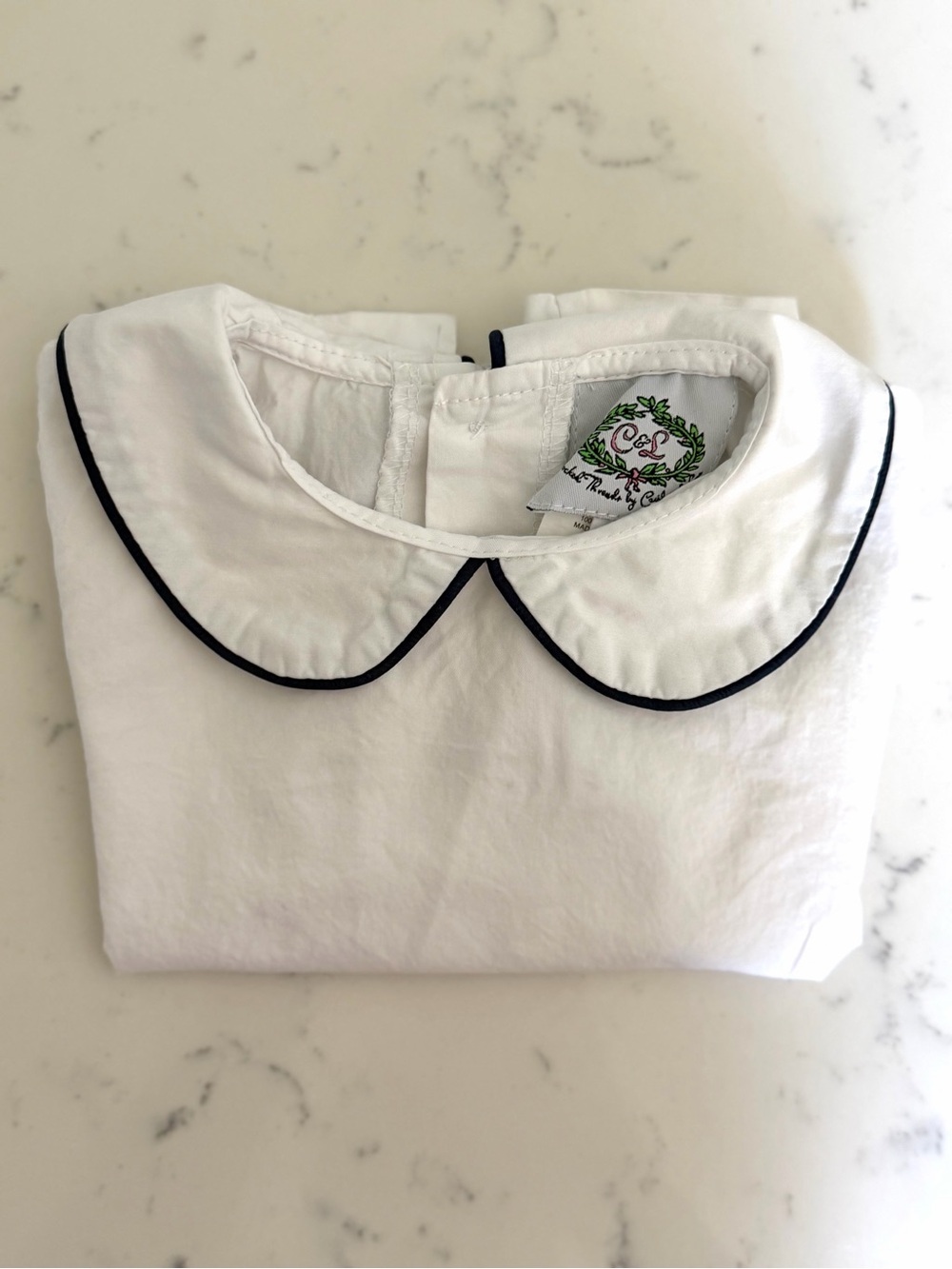 White Peter Pan Collar Top with navy Piping